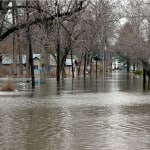 Flood Insurance System Overhaul Has Many Worried - flooded streets and homes
