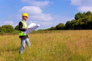 Builder or Developer looking at site plans for new Project